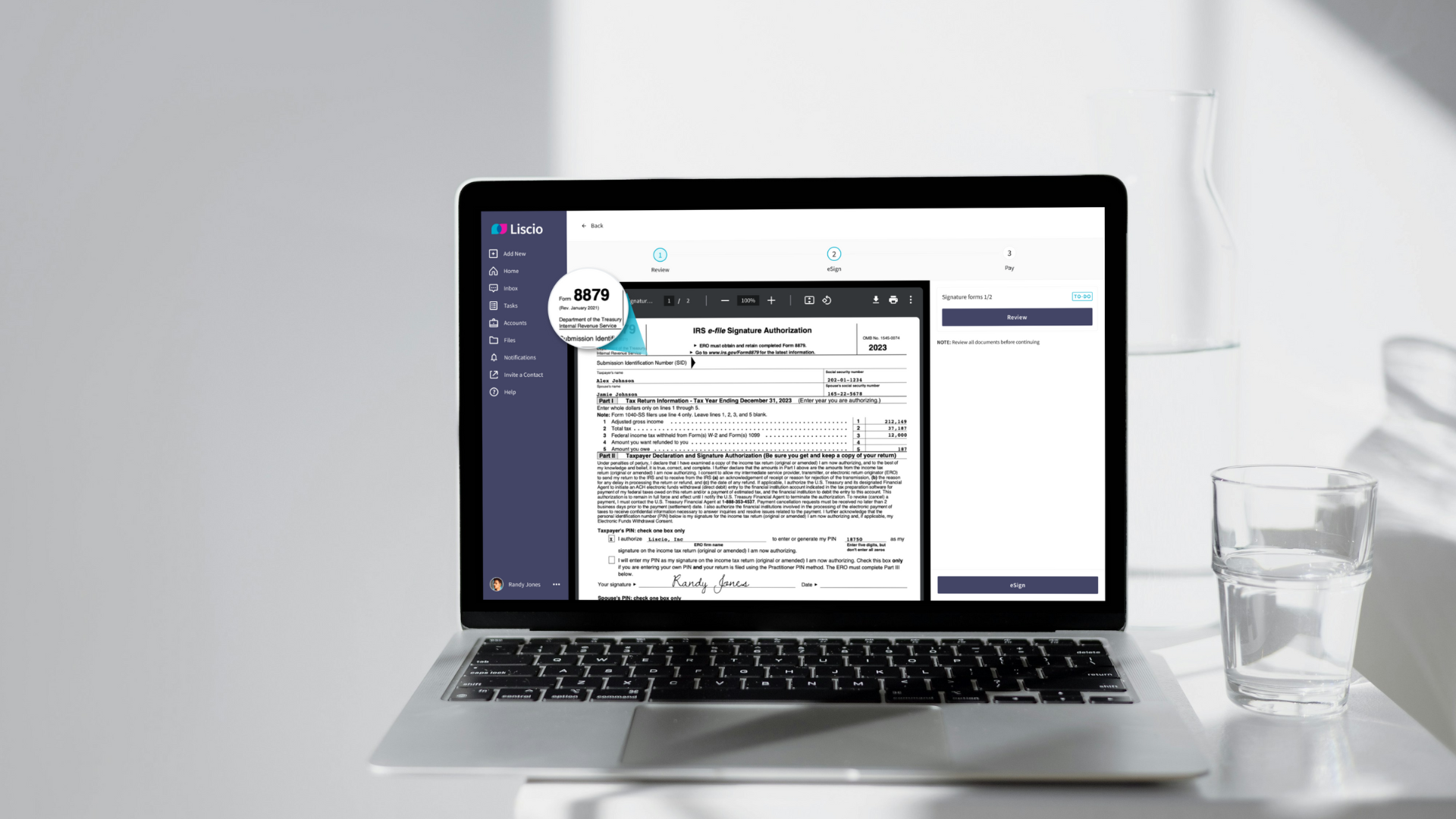 Laptop showing Form 8879 in the Liscio review and e-sign workflow.